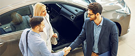 Photo of Couple buying a car